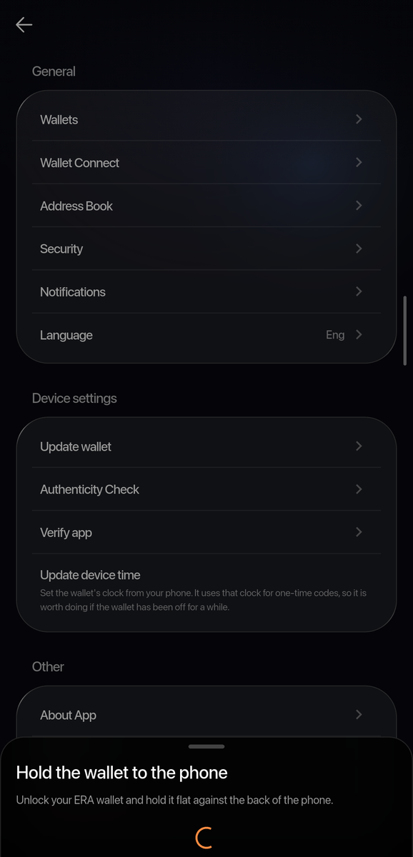 Bottom sheet over Settings: Hold the wallet to the phone — Unlock your ERA wallet and hold it flat against the back of the phone, with a spinner.