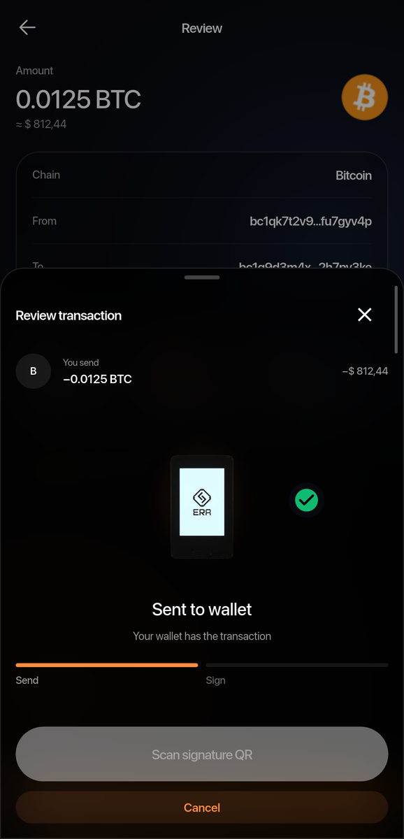 The sheet with a green tick beside the device: "Sent to wallet - Your wallet has the transaction", the first half of the Send / Sign bar filled.
